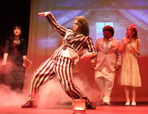 Photo by Marina Blatt
Beetlejuice dances creepily in front of a ghost-torturing contraption. From left, Liv Phillips, Ray Graham Ray, Cyrus Amor and Cora Fix.