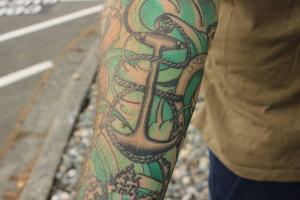(Photo by Allyson Ballard) Faulises anchor tattoo: more ink dedicated to his service.