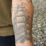 (Photo by Allyson Ballard) Faulise has several nautical tattoos, including this ship on his inner forearm.