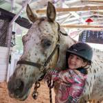 (Photo by David Welton) Laila Carlson, 9, of Langley celebrated her first wins in the arena this year with Jewel, a 23-year-old Appaloosa.