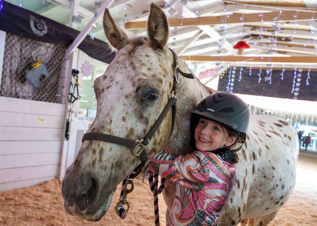 (Photo by David Welton) Laila Carlson, 9, of Langley celebrated her first wins in the arena this year with Jewel, a 23-year-old Appaloosa.