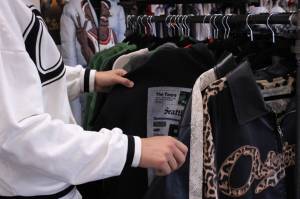 Ronning peruses the selection at Stay Original Market. Photo by Allyson Ballard