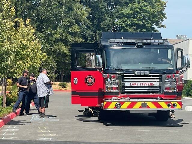 Photo provided
A community member admires a fire truck at the previous community day.