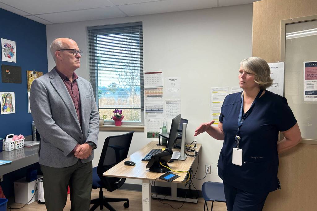 (Photo by Allyson Ballard) Nursing Supervisor Cindy Buske gave U.S. Rep. Rick Larsen a tour of the stabilization facility, the first step on the journey to recovery for many patients.