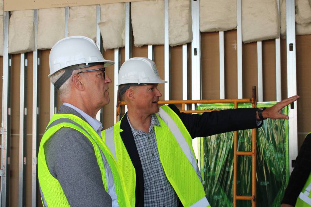 (Photo by Allyson Ballard) Principal Architect of NAC Architecture Philip Riedel informed tour attendants of Crescent Harbors new features, like the addition of solar panels.