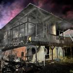 (Photo by South Whidbey Fire/EMS) A fire engulfed a home in the Mutiny Bay area in the early hours of Aug. 22.