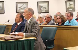 Photo by Jessie Stensland
Tim Hazelo, at far left, listens as the judge decides his sentence Monday afternoon.