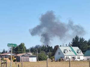 (Photo by Erica Fisher) A plume of smoke from the fire could be seen around North Whidbey.