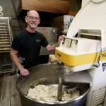 (Photo by David Welton) John Auburn, the owner of Whidbey Island Bagel Factory, is selling all three of his restaurants to his employees.