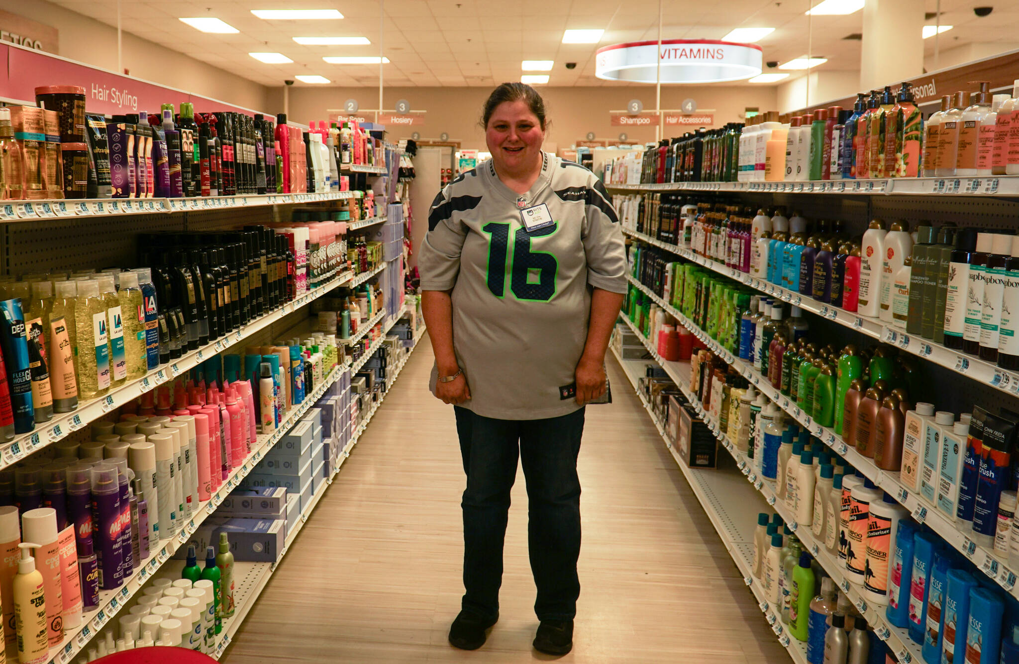 Photo by Luisa Loi
Stacie Lanners, 41, stands in the pharmacy where she has been employed for 20 years. She will be celebrating her 20th anniversary this Friday.
