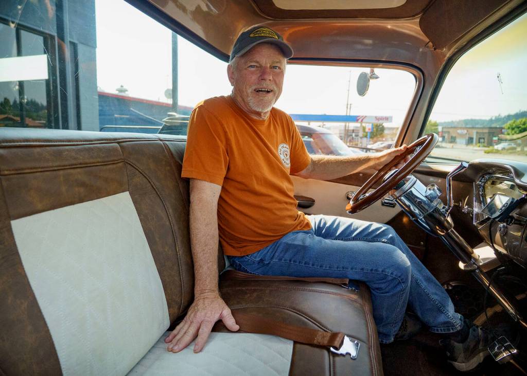 (Photo by David Welton) Jeff Faris sits in his cream-and-tan 1959 Chevrolet Apache, the interior done by Artisan Stitchworks, won Outstanding Interior Truck at the Portland Roadster show in March this year.