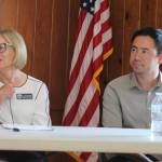 Oak Harbor board President Lynn Goebel state Rep. Clyde Shavers are all ears at the League of Woman Voter panel about school finances. (Photo by Marina Blatt.)