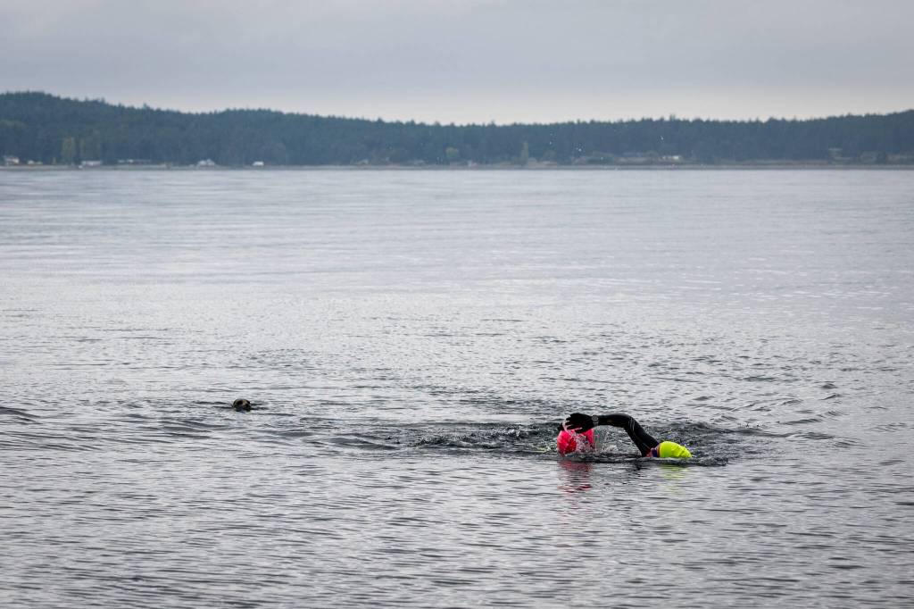 (Photo provided by Sailing with Paul Porter) Paige Nuzzolillo embarks on long distance solo swims, often armed with nothing but a buoy and fins.