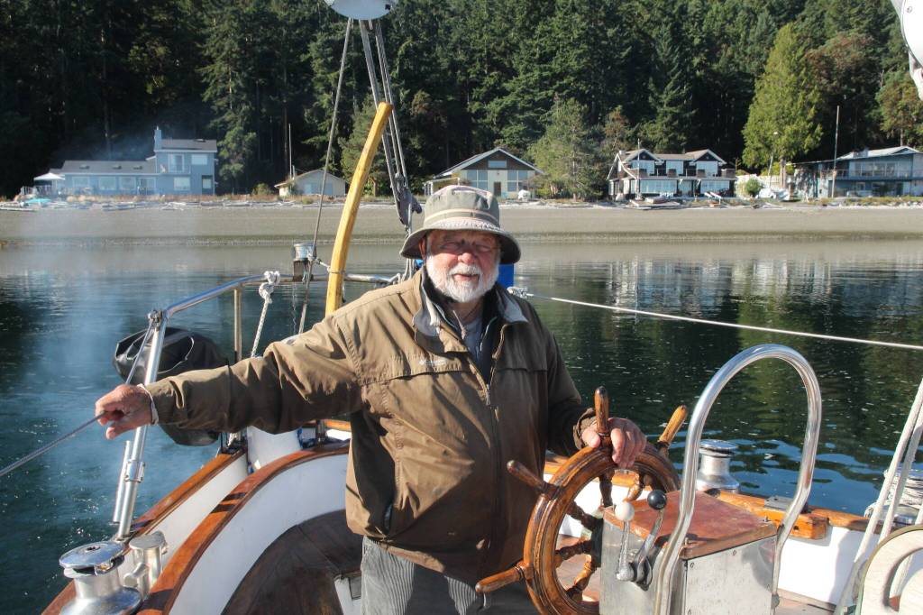 (Photo by Marina Blatt) Smiths favorite pastime is steering his boat, the Culmination.