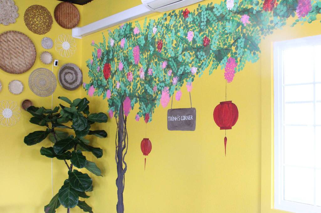 Photo by Allyson Ballard
The bougainvillea mural inside Trinhs Corner is reminiscent of those found in Vietnam.