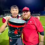 Liam Blas, at left, and Bennett Richter are part of a pack of Wolves bringing The Bucket back to Coupeville. (Kevin Blas photo)