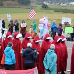 Photo by Sarah Bellis
Red-robed figures made their way through the crowd. (Photo by Sarah Billis)