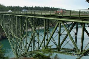 Cars and pedestrians cross over the Deception Pass bridge and take in the views. (Photo by Marina Blatt)