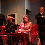 Charles and his guests meet a chaotic medium. From left are Ben Honeycutt (Dr. Bradman), Kellen Cox (Mrs. Bradman), Tiffany Scribner (Madame Arcati) and Lachlan Waterbury (Charles). (Photo by Marina Blatt)