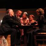 Friends and spouses sit around a table to humor a medium, whom they are very dubious of. From left are Ben Honeycutt (Dr. Bradman), Lachlan Waterbury (Charles), Tiffany Scribner (Madame Arcati), Shealyn Christie (Ruth) and Kellen Cox (Mrs. Bradman). (Photo by Marina Blatt)