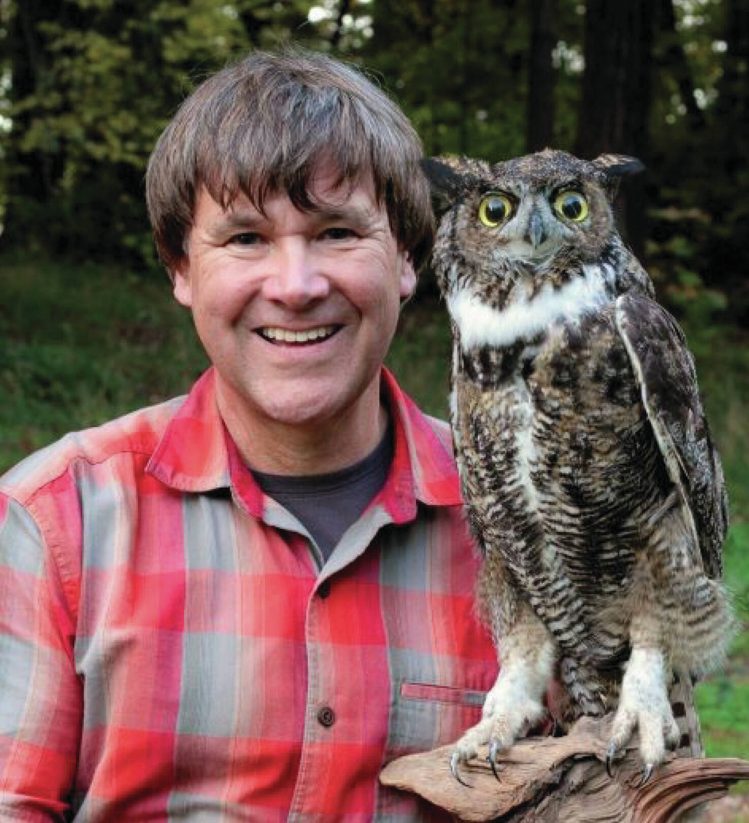 Ed Dominquez in pictured with a great horned owl
