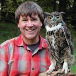 Ed Dominquez in pictured with a great horned owl