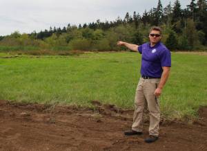 File photo
Chris Whiteman stands on his property on North Whidbey.