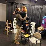 (Photo by Ken Merrell) Chad Hadwick (Kyle Collins) and Kat McMath (Betsy Kohler Harvey) share a romantic embrace.
