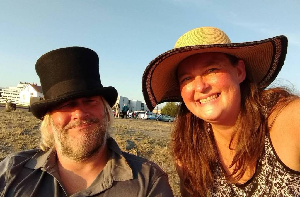 Jeff Pangburn relaxes at the beach in his favorite top hat next to his sister, Cheryl Rafert.
