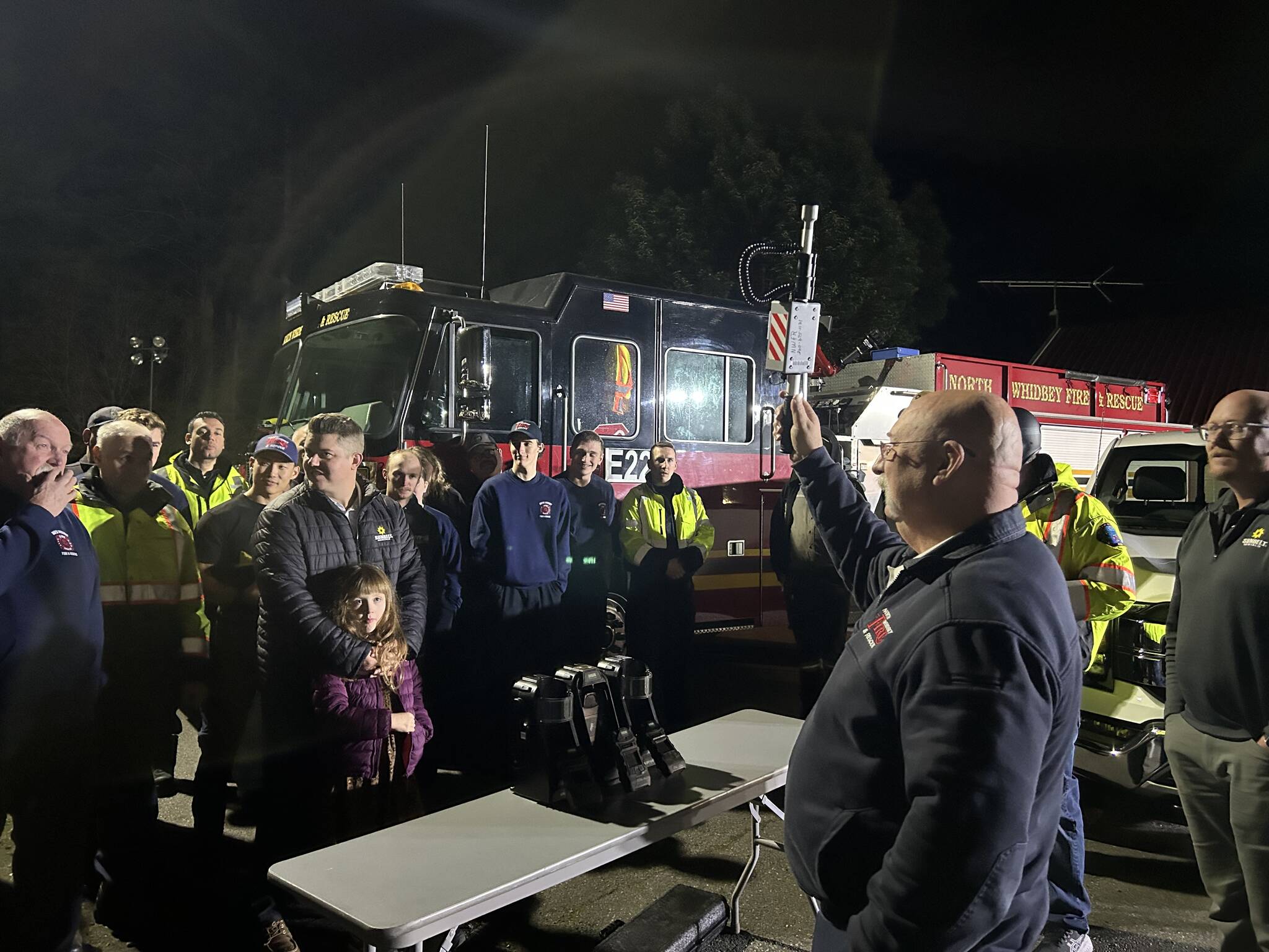 Photo by Allyson Ballard
Fire Chief Chris Swiger and members of North Whidbey Fire and Rescue gathered Monday for a peek at the new gear.