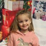 (Photo by Marina Blatt) Addison (Addy) Taylor, age four, said she wants more toys from Santa.