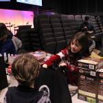 (Photo by Allyson Ballard) Volunteers put together each bag assembly line-style.
