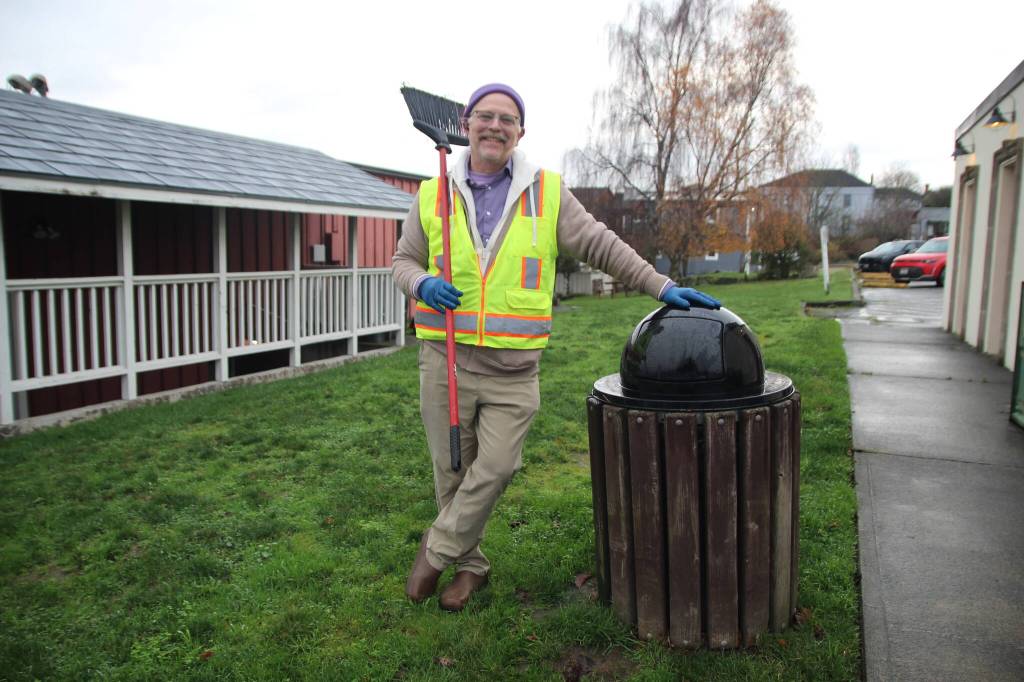 Photo by Marina Blatt
Lachlan Waterbury, the singing janitor of Coupeville, empties public trashes, cleans public toilets and occasionally landscapes downtown Coupeville, all while dressed to the nines and singing his favorite tunes.