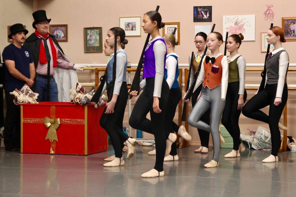 Two dads playing Drosselmeyer await the night-time battle.