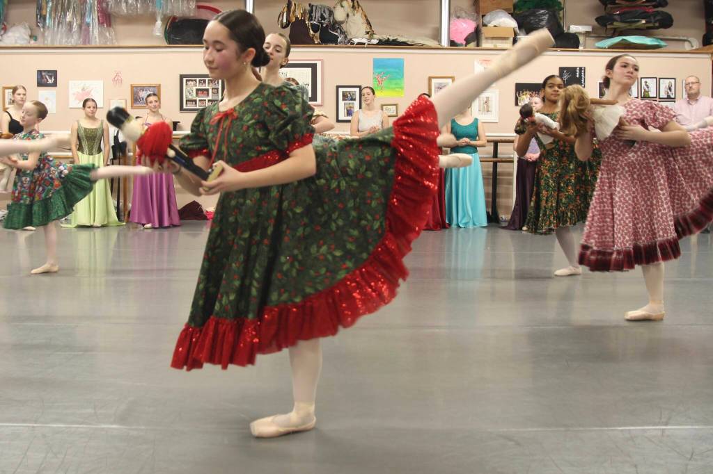 Hannah Brackeen, age 15, in the role of Clara, holds her beautiful nutcracker toy.