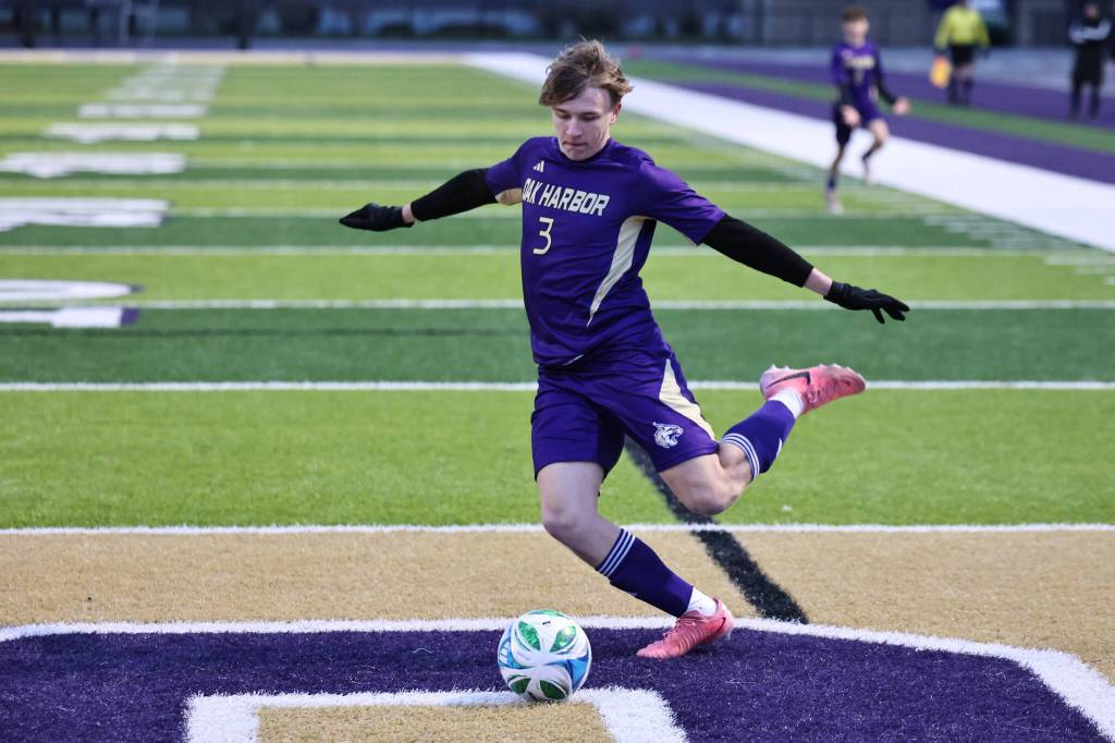 (Photo by John Fisken) Oak Harbor forward Frank Smith kicks the ball during the Wildcats home opening game in March against Nooksack Valley. Oak Harbor won 6-0 and scored three goals in the first 10 minutes of the contest.