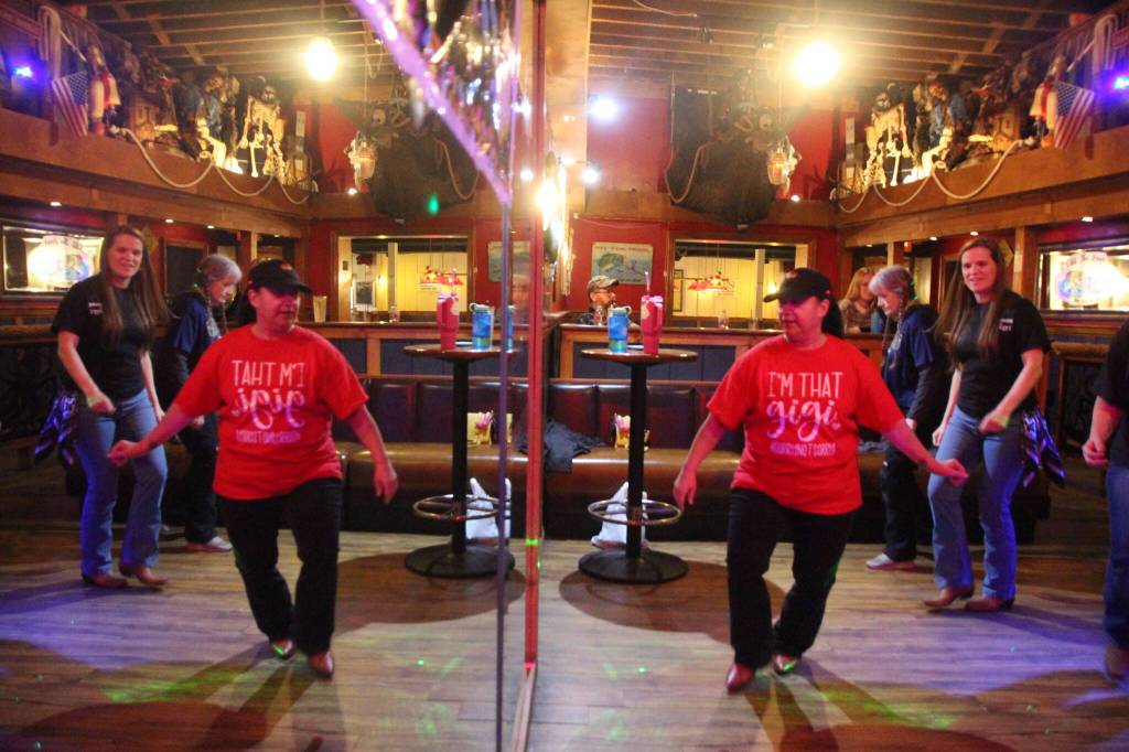 Iglesias dances in front of the mirror at Off the Hook in Oak Harbor, showcasing some new moves to her eager audience.