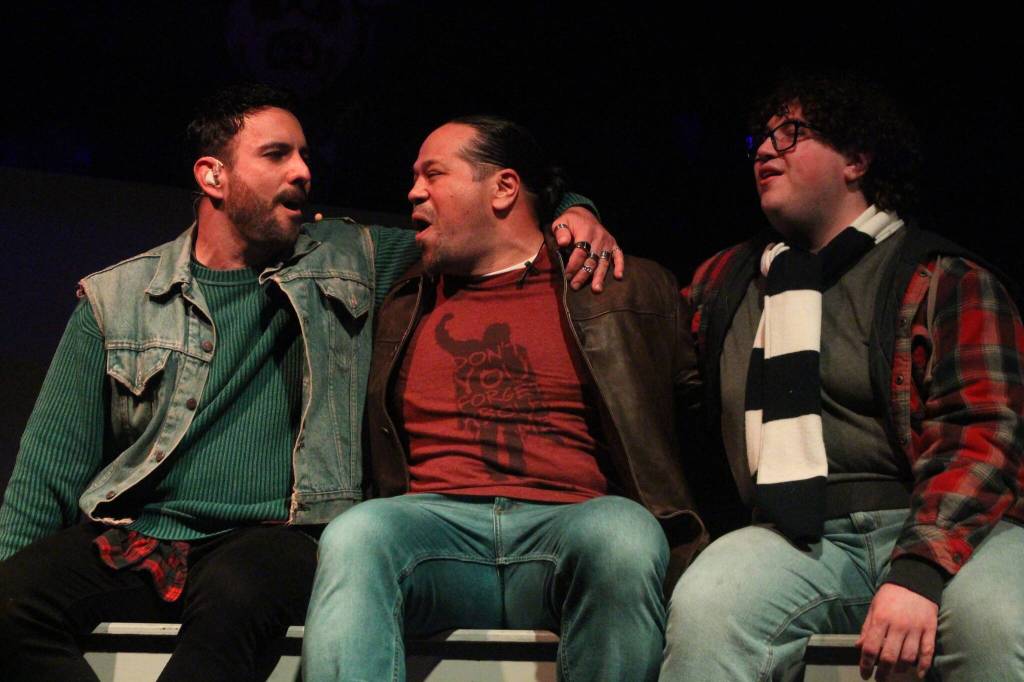 (Photo by Marina Blatt) Friends are each others biggest support as they face their individual struggles in RENT. From left are Cris Matochi, Karl Borja and Andrew Pierzchala.