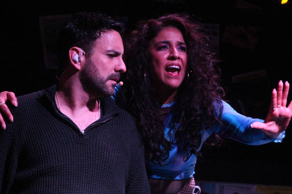 (Photo by Marina Blatt) Karla Luna playing Mimi Marquez and Cris Matochi playing Roger Davis sing Another day, from RENT as Davis grapples with hiding that he has HIV.