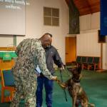 Official Navy photo by Eric Medina. Freddys obedience is one of the traits that made him a great military working dog.