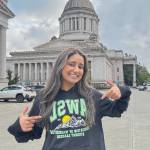 Photo provided. Aanchal Batwara smiles outside the Washington State Capitol after months of fundraising, logistics and late-night planning.