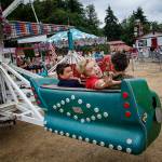 Kids on a carnival ride at the Island County Fair in July 2015.