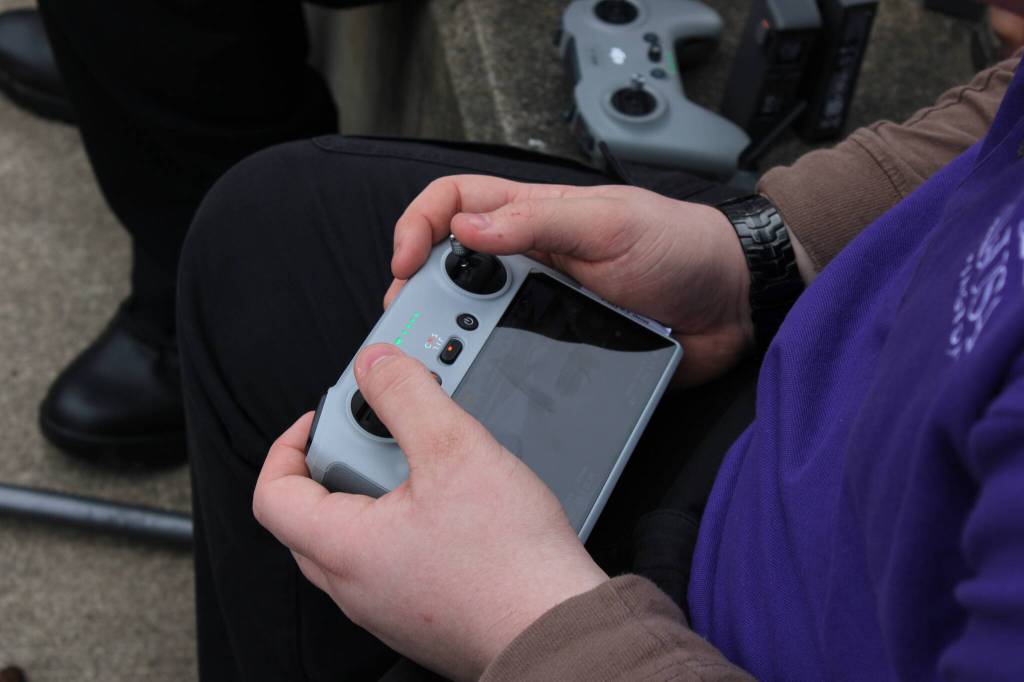 Photos by Allyson Ballard. Or, students can view video feed on handheld controllers with screens.