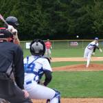 Photo by Nathan Whalen
Pitcher Weston Dill throws one over home plate.