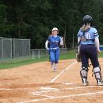 Photo by Nathan Whalen
South Whidbey sophomore Zoe Broderick runs home during a game March 23 where the Falcons topped Sultan 16-6.