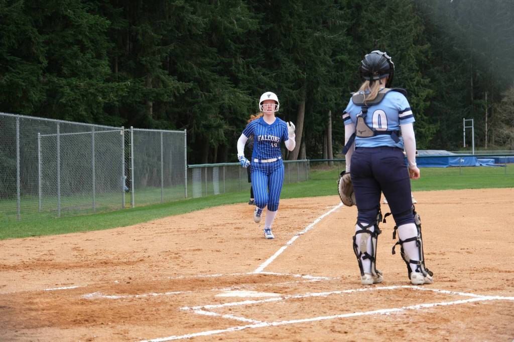 Photo by Nathan Whalen
South Whidbey sophomore Zoe Broderick runs home during a game March 23 where the Falcons topped Sultan 16-6.
