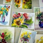 Photo by David Welton. Artists practiced painting flowers at a recent class at Create Space.