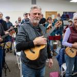 Photo by David Welton. A large group of strummers attended a recent ukulele class at Create Space Langley.