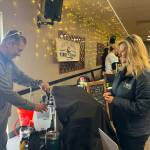 Photo provided. Abbie Martin samples a beverage at a previous Wine, Bites and Brews event.