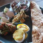 Photo by Marina Blatt
The PNW Relish Tray of Dreams contained miyagi oysters with rhubarb mignonette, radishes on seaweed butter, crispy Dog Island mushrooms and more.